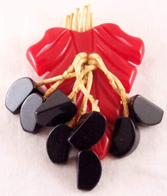 BP106 red bakelite wedge geometric dangly pin